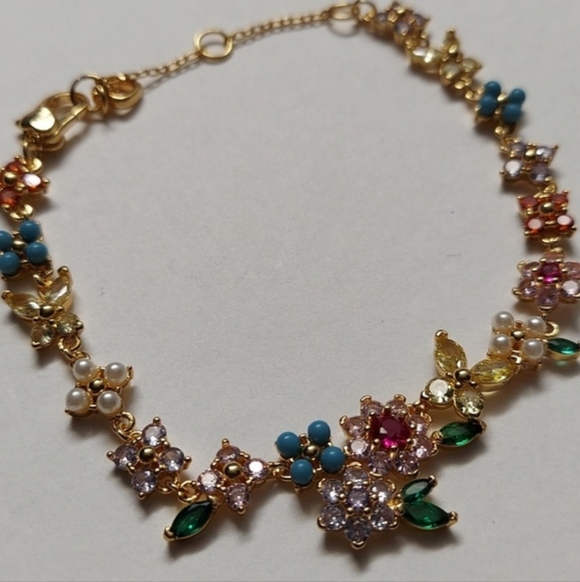 Kate Spade Gold Bracelet with Multicolor Floral Charms - Picture 4 of 7